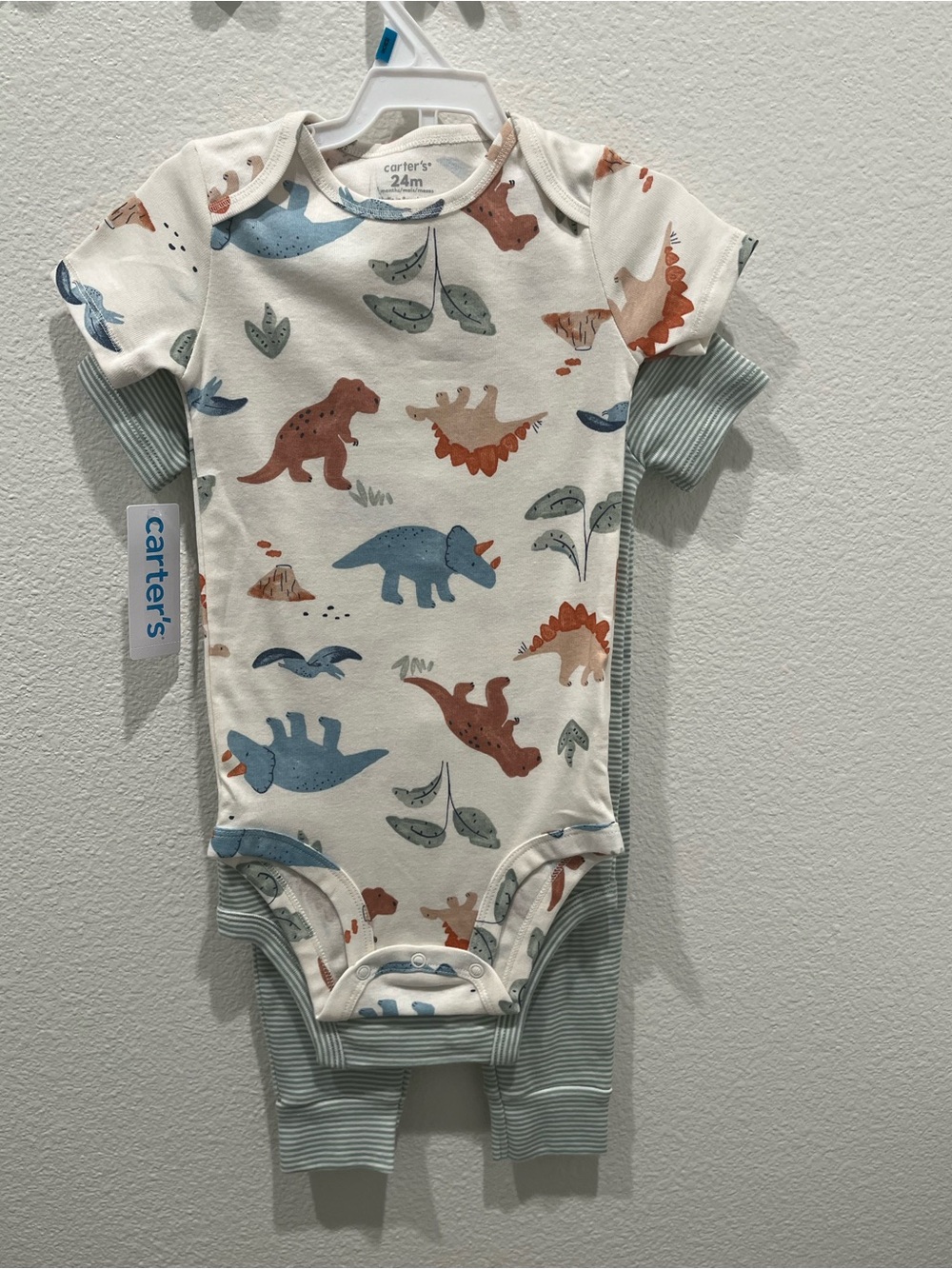 Carter's Cream One-Piece Bodysuit with Blue and Brown Dinosaur Print